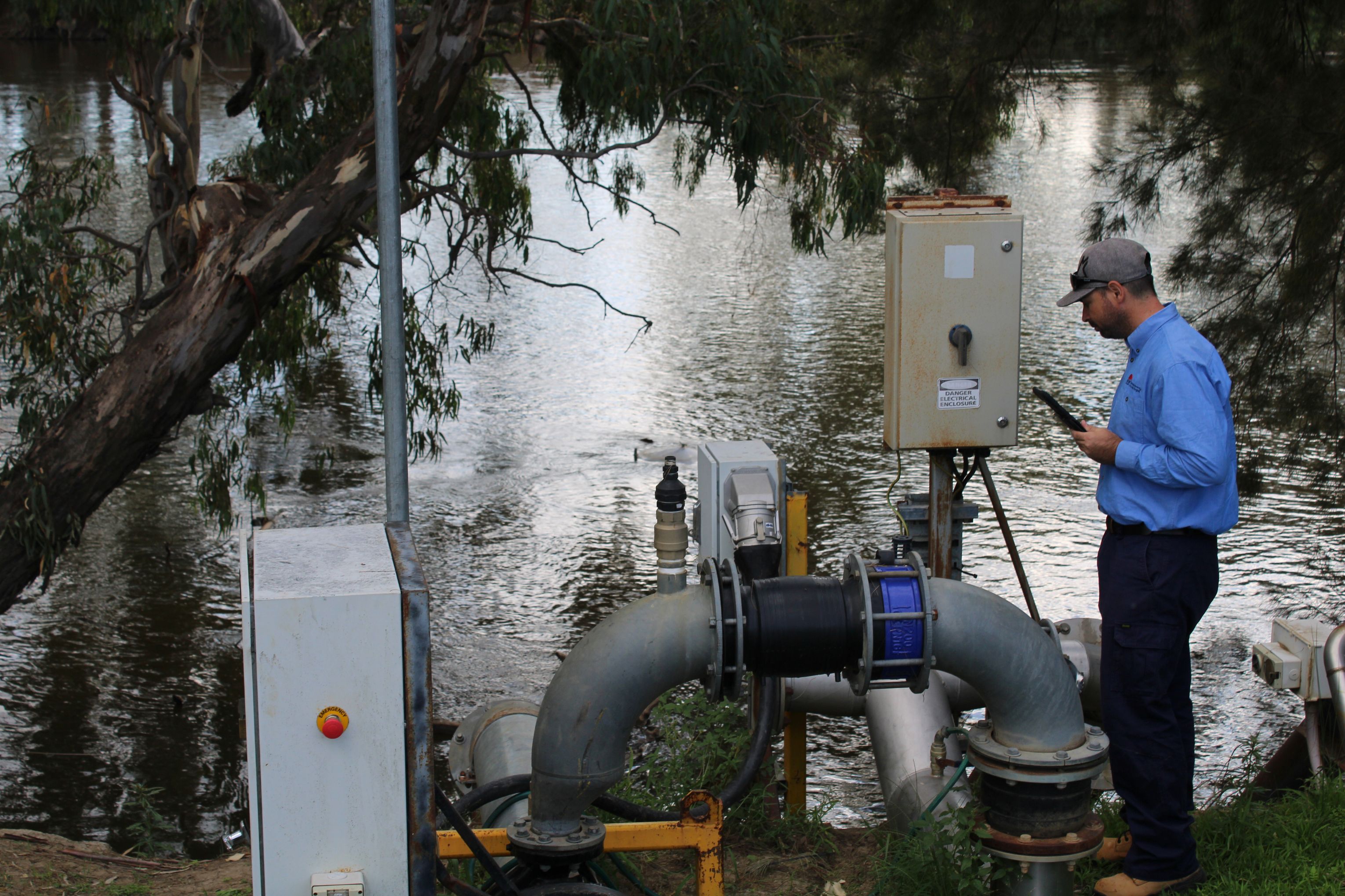NRAR officer inspect a water pump