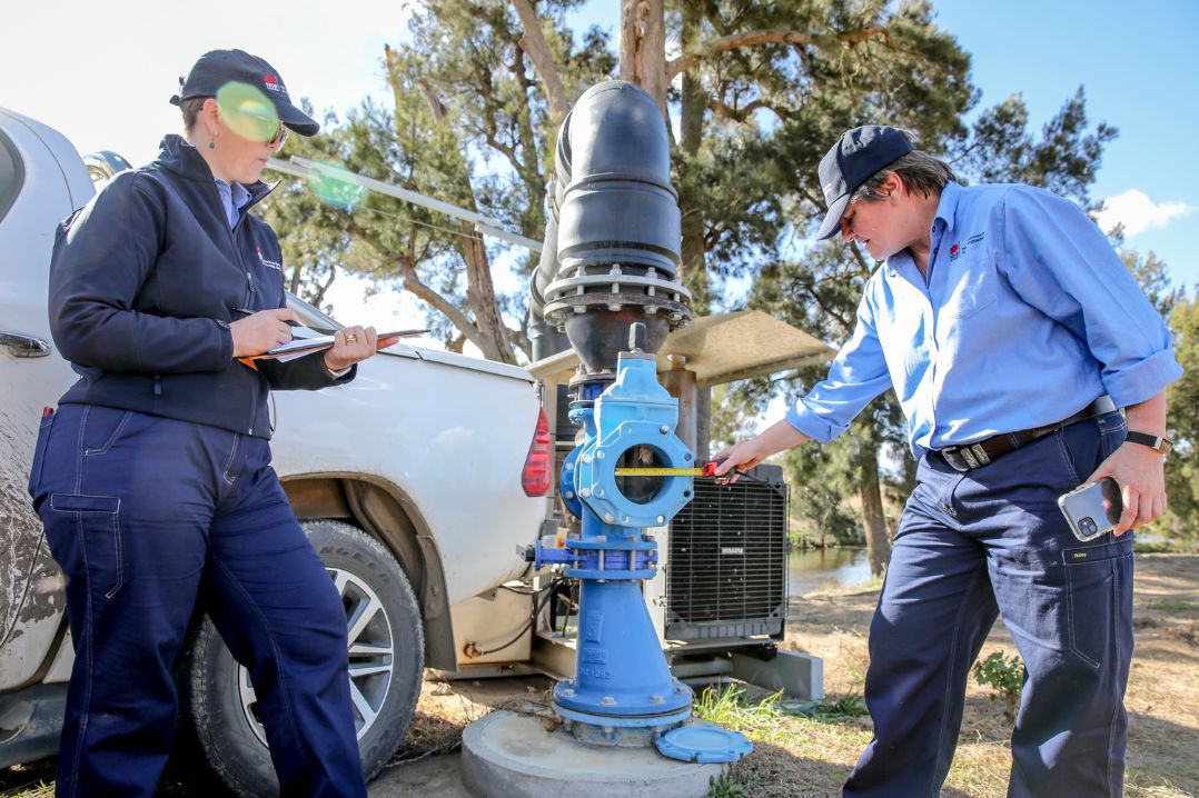 NRAR officers inspecting a water pump